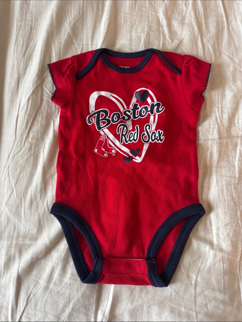 Genuine Merchandise Red Baby Onesie with Navy Trim